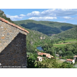 Le Village( au fond L Orb )